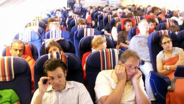 Pasajeros en un avión Pasajeros en un avión