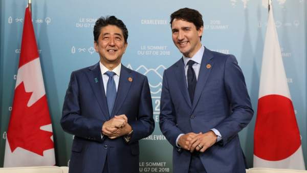 Shinzo Abe y Justin Trudeau Shinzo Abe y Justin Trudeau