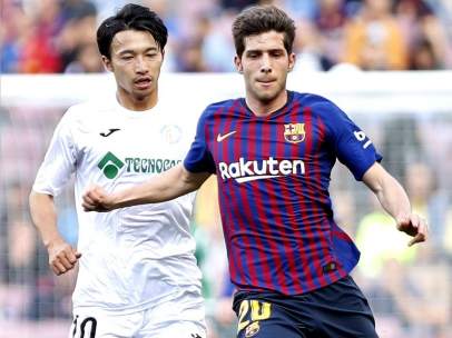 Gaku y Sergi Roberto