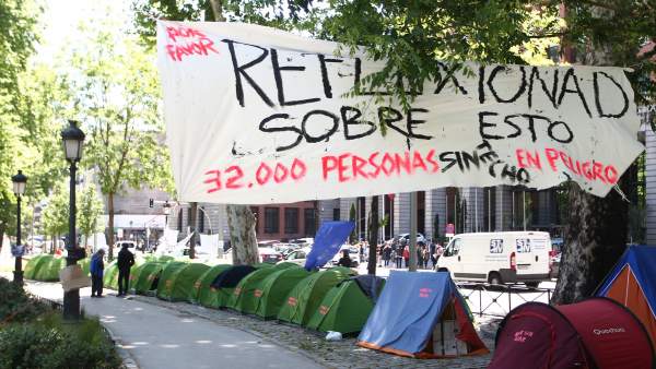 Acampada personas sin hogar en el Paseo del Prado Acampada personas sin hogar en el Paseo del Prado