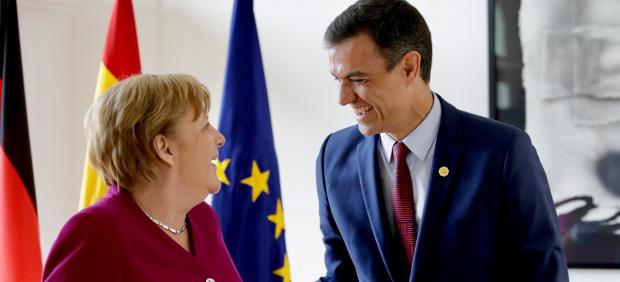 Pedro Sánchez y Angela Merkel