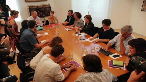 Reunión de PSN, Geroa Bai, Podemos e I-E en el Parlamento para negociar un acuerdo de programa de gobierno en Navarra Reunión de PSN, Geroa Bai, Podemos e I-E en el Parlamento para negociar un acuerdo de programa de gobierno en Navarra