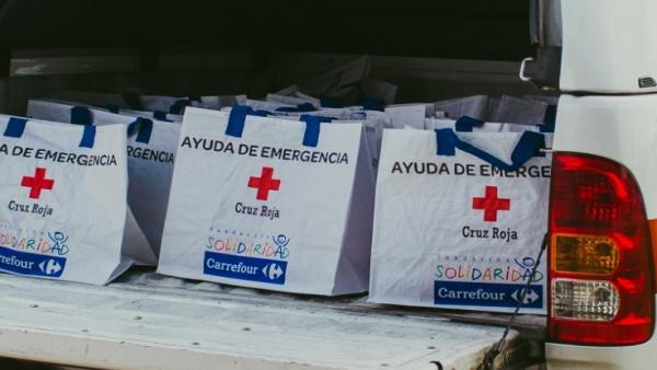 Bolsas de ayuda de emergencia de Carrefour y Cruz Roja. Bolsas de ayuda de emergencia de Carrefour y Cruz Roja.