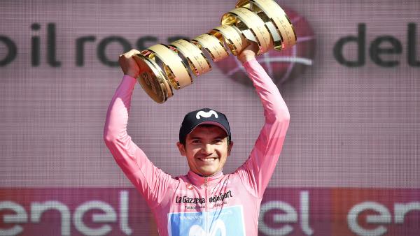 02 June 2019, Italy, Verona: Ecuadorian cyclist Richard Carapaz of team Movistar holds the 'Never ending trophy on the podium after the end of the twenty first stage of the 102nd edition of the Giro d'Italia cycling race, a 17 km individual time trial in 02 June 2019, Italy, Verona: Ecuadorian cyclist Richard Carapaz of team Movistar holds the 'Never ending trophy on the podium after the end of the twenty first stage of the 102nd edition of the Giro d'Italia cycling race, a 17 km individual time trial in